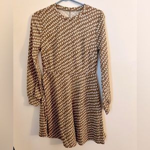 SHEIN brown long sleeve mini dress with a white leaf pattern.